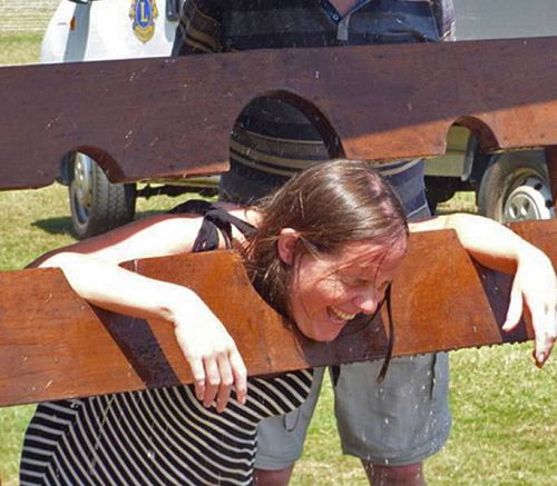 Wet sponge fun in the stocks at the Lions Funfest