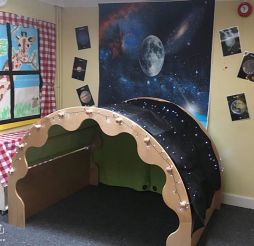 The Den adorned with star lights for the Space theme